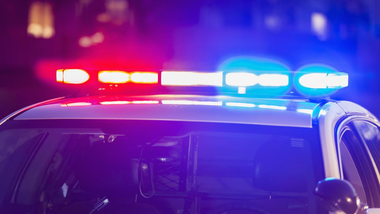 Police car with lights on. 